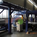 气瓶卷筒后下料机